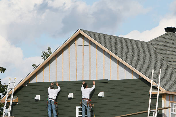Professional Siding Contractor technician working in Mason, TX